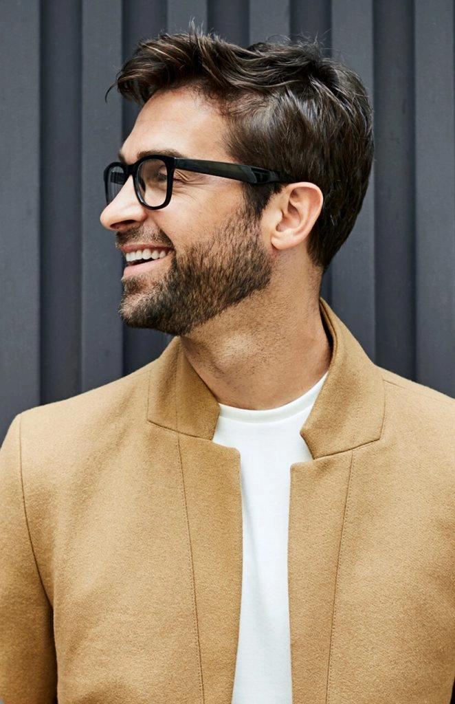 Smiling man with new eyeglasses